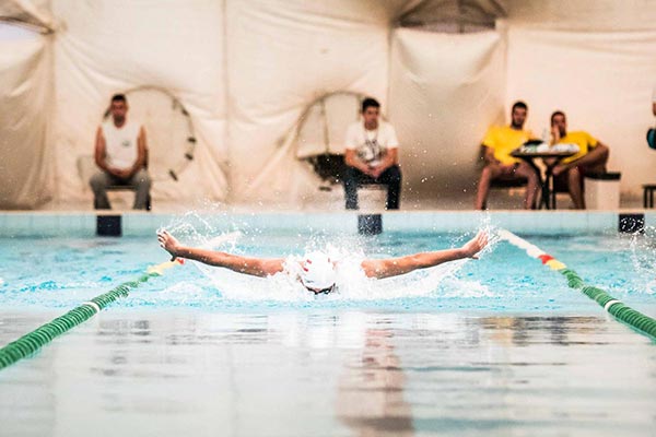 Swimmers racing in the pool