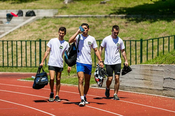 Athletes sprinting on the track